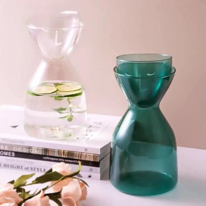 Teal hourglass glass tea infuser water bottle featuring a sleek modern design and wide mouth for decorbites glass tea use