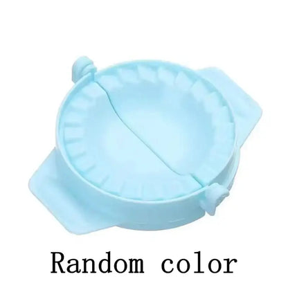 Light blue silicone dumpling skin maker with fluted edge and handles for dough press tool use in kitchen