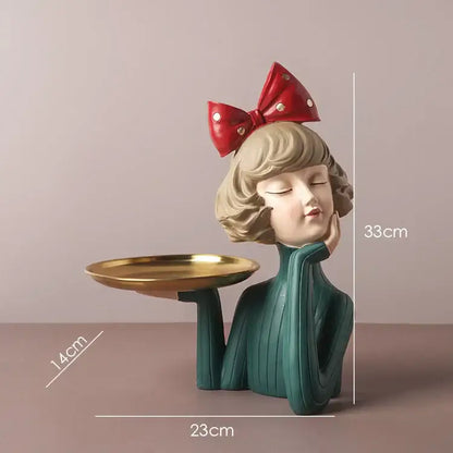 A teal bowknot girl resin figurine with blonde hair holding a gold tray ideal for decorbites bowknot girl decor
