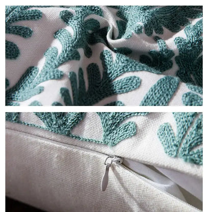 White cushion cover with teal embroidered leaf patterns for decorbites blue geometric living room decor