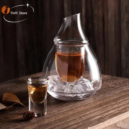 Clear glass wine pot with a sleek teardrop design and narrow spout for dining room and bar use