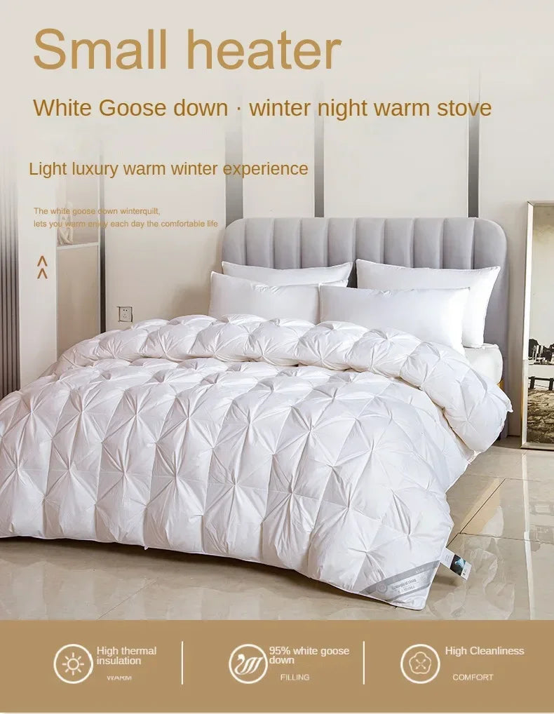 White goose down comforter with quilted geometric pattern and thickened core for warmth and comfort