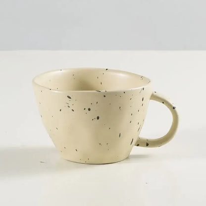 Cream-colored terracotta speckled creative ceramic espresso cup from decorbites cup set for dining room use