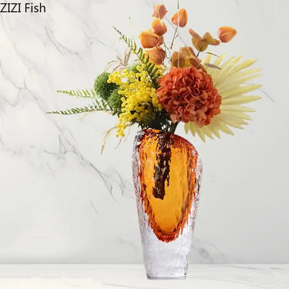 A translucent amber glass vase with a textured hammered finish and sleek modern silhouette for living room decor