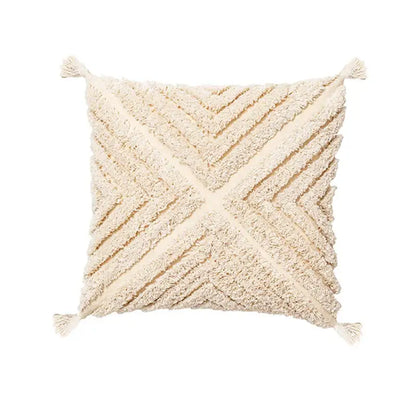 Cream-colored textured cushion cover with woven chevron pattern and decorbites beige tassels for living room decor