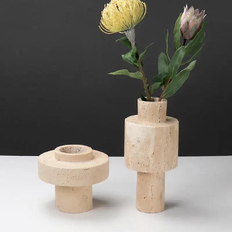 Textured beige travertine stone vase with geometric stacked cylindrical forms for dining room decorbites beige travertine