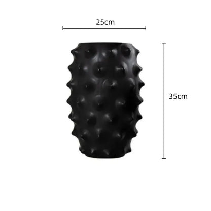 Black ceramic flower vase with textured spiky surface for living room decor by decorbites black ceramic collection
