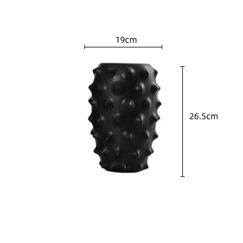 Textured black ceramic flower vase decorbites with spiky surface and rounded protrusions for living room decor
