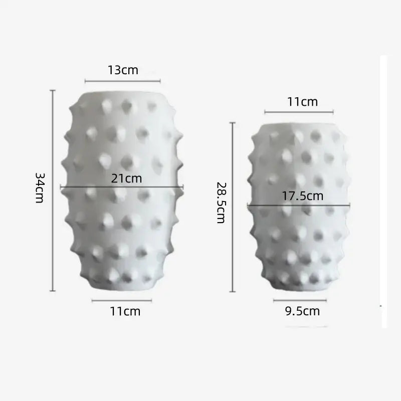 Two white textured ceramic flower vases contrasting with decorbites black ceramic flower vase for living room decor