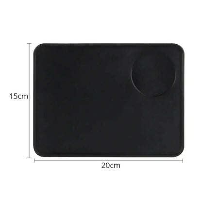 Black rectangular textured espresso distribution tool with rounded corners and circular cutout for precise espresso distribution