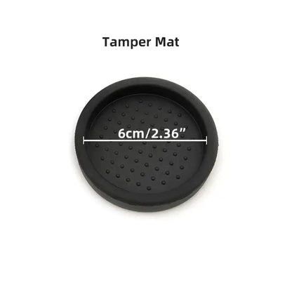 Textured black circular espresso distribution tool tamper mat with raised dots for improved espresso distribution