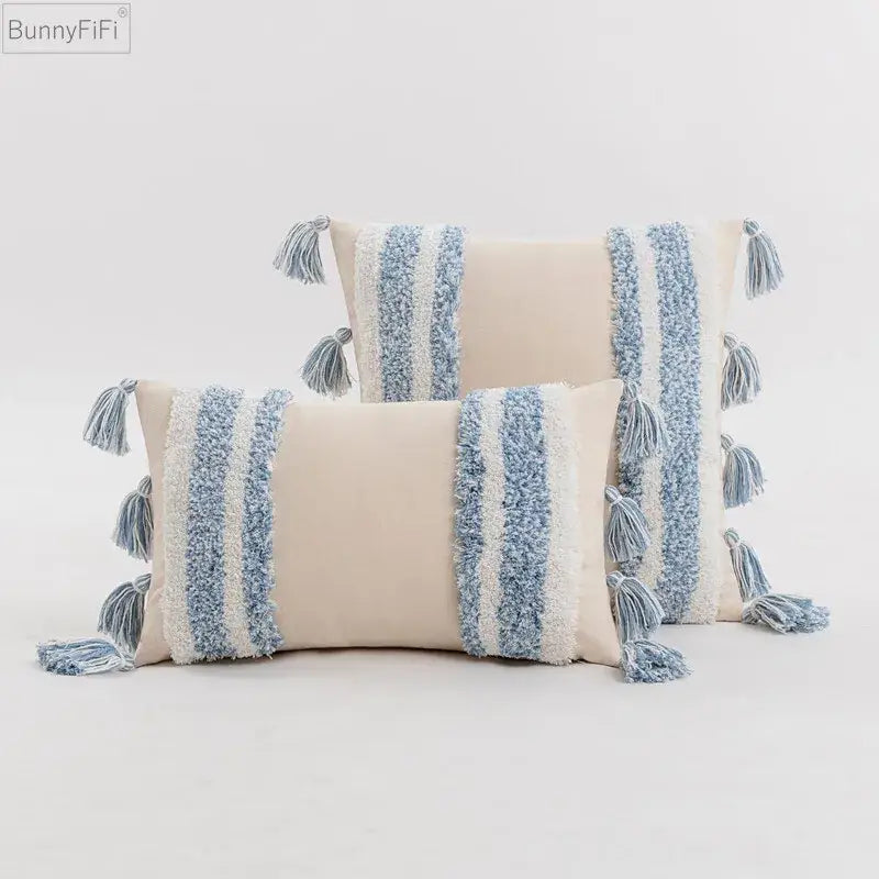 Beige rectangular cushion cover with textured blue and white vertical stripes and decorative tassels for home decor decorbites blue grey