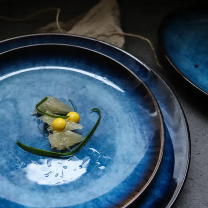 Deep blue ceramic dinner plate with glossy gradient glaze and subtle texture from decorbites dinner plate set