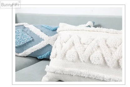 White textured throw pillow with fluffy pom-pom and fringe detailing for decorbites blue geometric cushion cover decor