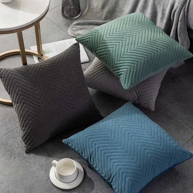 Set of three square cushion covers in muted teal charcoal gray and dusty blue with textured chevron quilting decorbites blue wave