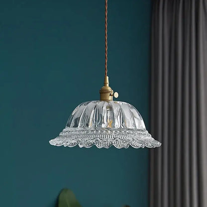 Clear glass led pendant light with fluted ruffled design and brass hardware by decorbites for kitchen decor