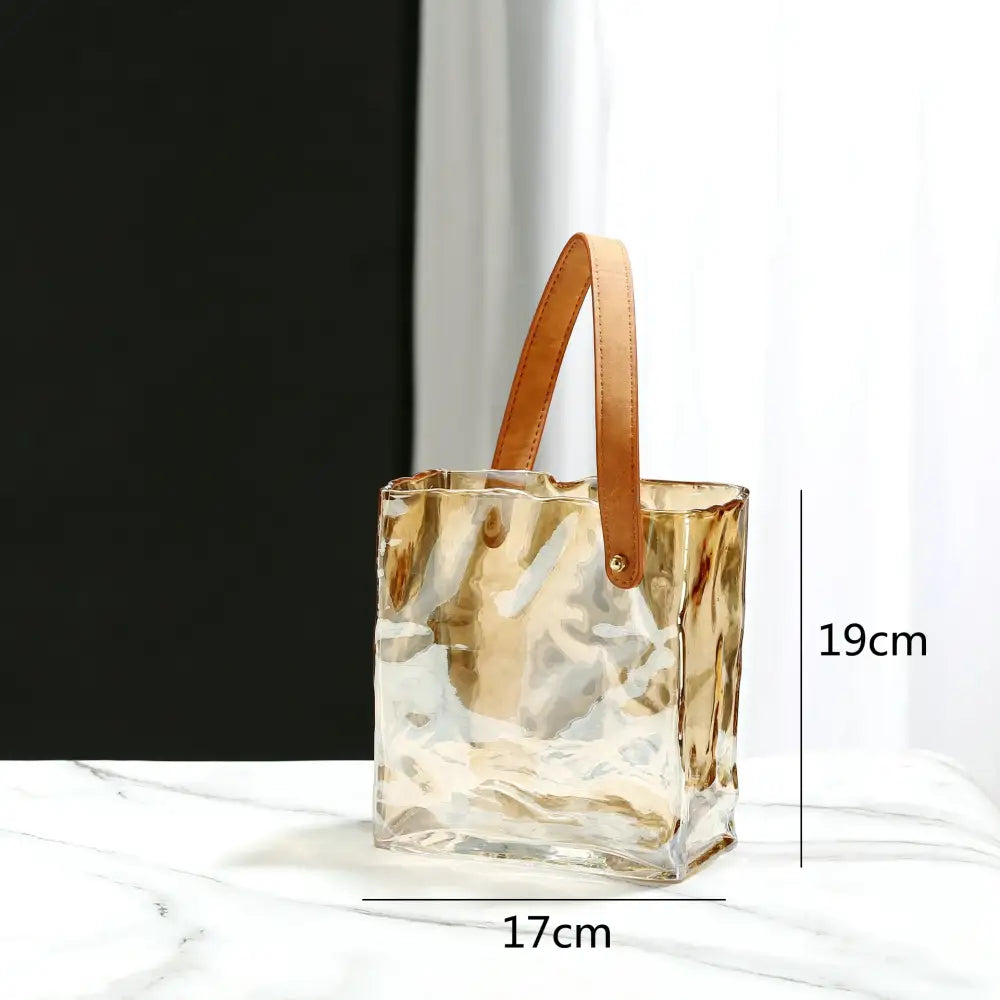 Transparent glass bucket bag with tan leather handle suitable as decorbites clear glass vase for living room decor