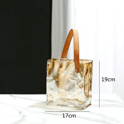 Transparent glass bucket bag with tan leather handle suitable as decorbites clear glass vase for living room decor