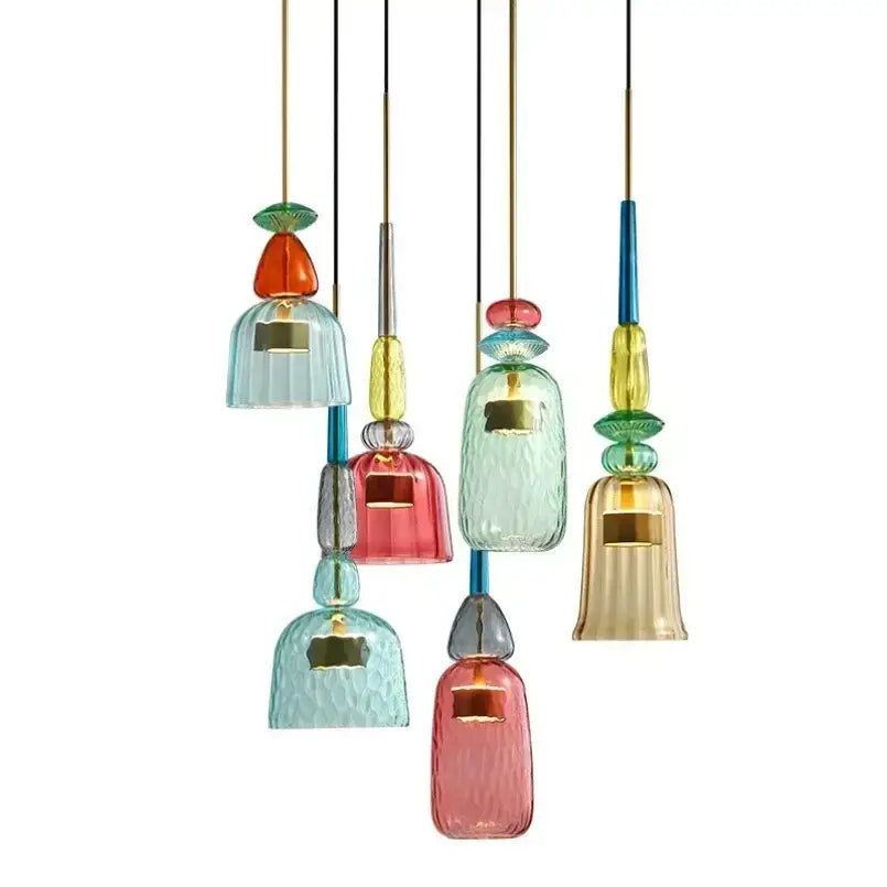 A set of colorful textured glass pendant lights with gold accents for kitchen dining room chandelier lighting