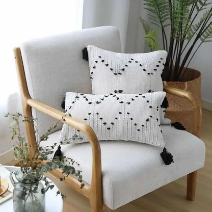 Textured cream cushion cover with black embroidered dots and decorbites geometric tassels for living room decor