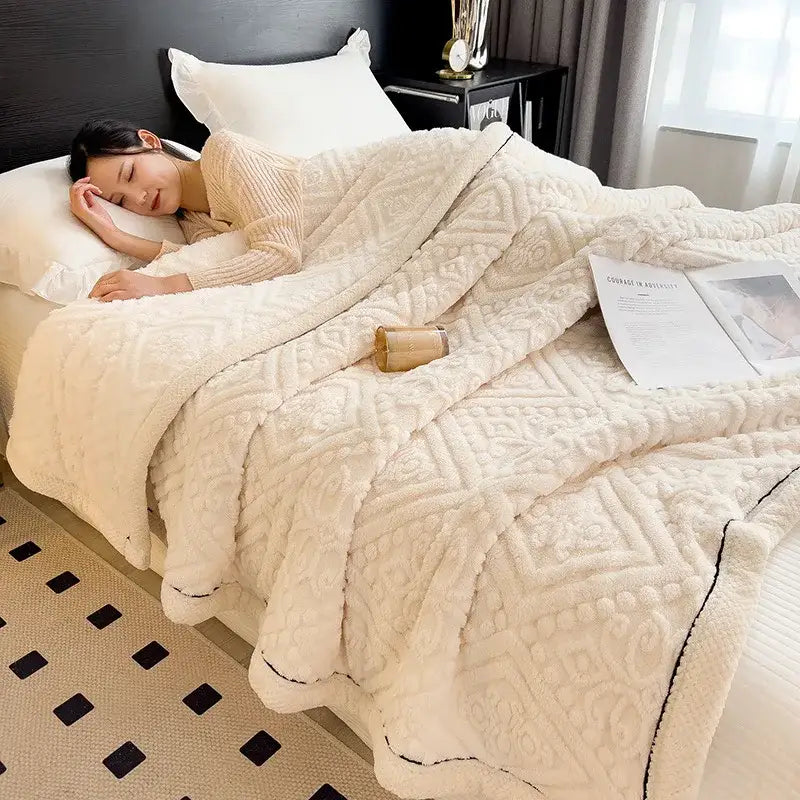 Cream coral fleece warm blanket with textured geometric pattern and black stitched trim by decorbites coral fleece