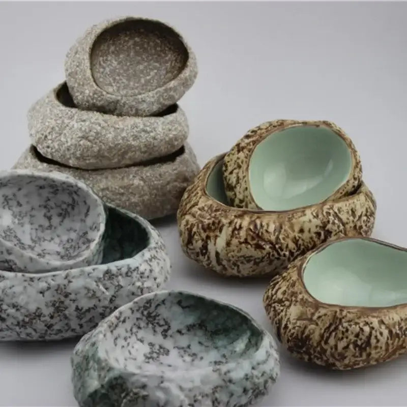 Handcrafted decorbites ceramic dessert plate with textured earthy speckled exterior and smooth pale green interior for dessert sashimi ice