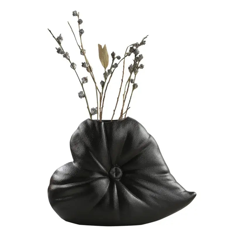 Black ceramic fluffy heart vase shaped like stylized lotus leaf with textured pleated surface for living room decorbites fluffy heart decor