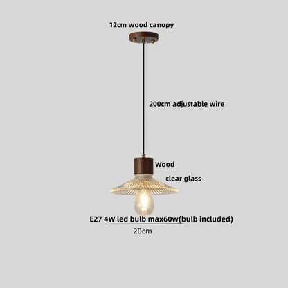 Rustic pendant light with dark wood canopy, adjustable black wire, and decorbites clear glass led shade with radial ribs