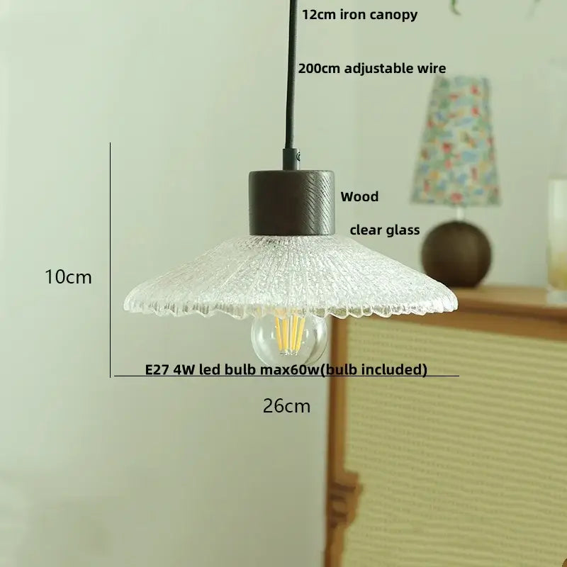 Clear glass led pendant light with textured scalloped shade and dark wood metal base for kitchen decorbites clear glass lighting