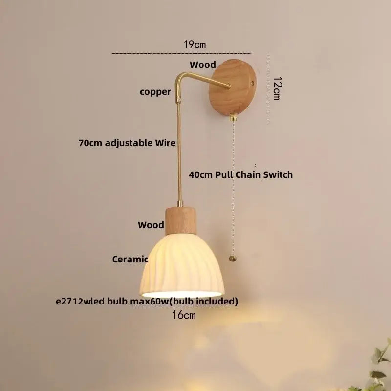A warm-toned ceramic lampshade with ribbed texture on an adjustable copper and wood arm decorbites adjustable led wall light