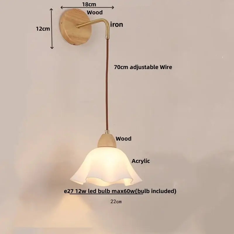 A warm-toned decorbites adjustable led wall light with wooden base and acrylic shade for bedroom sconce decor