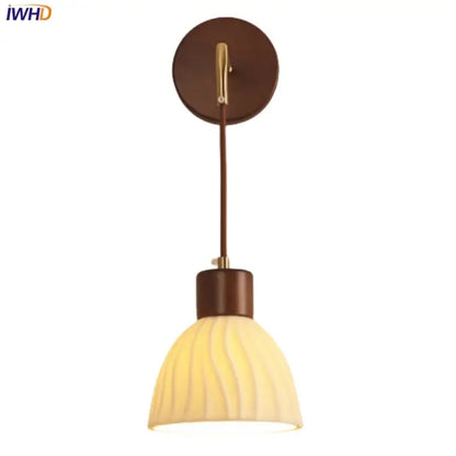 Warm-toned textured glass pendant light with brown wood base and brass hardware decorbites adjustable led wall light