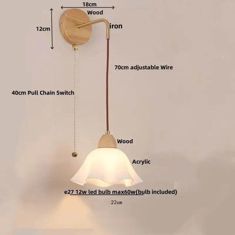 A warm-toned decorbites adjustable led wall light with wooden base, brass arm, pull chain, and acrylic shade