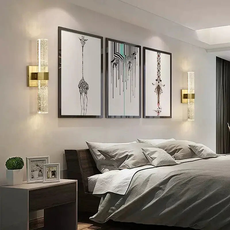 Gold wall sconce with textured glass panels and gold finish emitting warm diffusing light for bedroom decorbites wall sconce