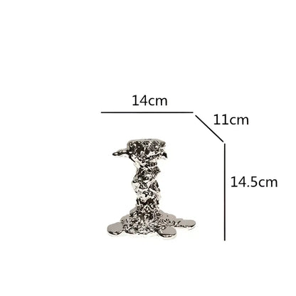 Silver metallic candlestick holder with textured twisted design and wide base for decorbites golden candlestick decor
