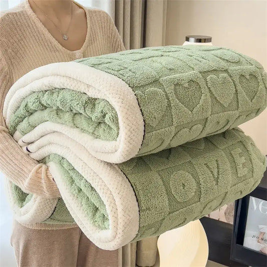 A cozy lamb wool blanket in green and cream fleece with a textured heart pattern for decorbites cozy lamb decor