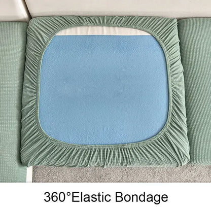 Light green elastic textured waterproof sofa cover with soft blue inner pad for living room use