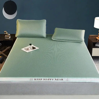 Light green textured cooling bed mat with keep happy bear branding made of 1800d cooling fibres pillowcases set