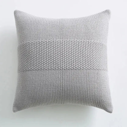 A soft light gray knit cushion cover with textured horizontal stitch patterns for living room decorbites decor
