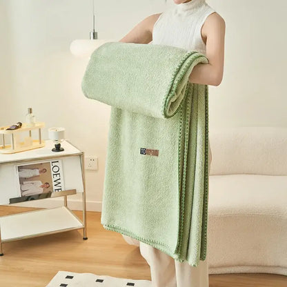 A soft mint green terry cloth bath towel with textured loops and neat edges for decorbites cloud comforter use