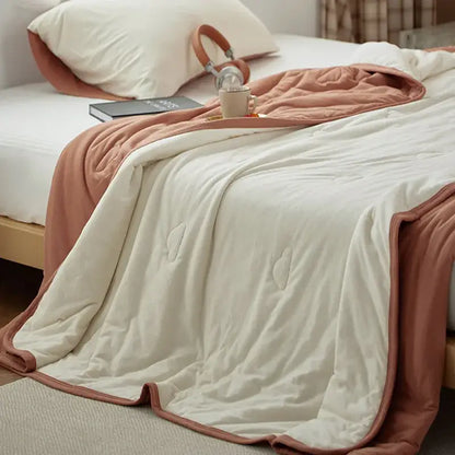 A cozy cream and dusty rose decorbites cotton summer comforter with a soft plush texture for bedroom cooling