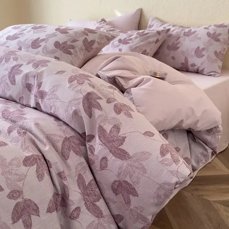 Soft lavender duvet cover with textured leaf pattern in muted purples on a decorbites cotton three-layer bedding set