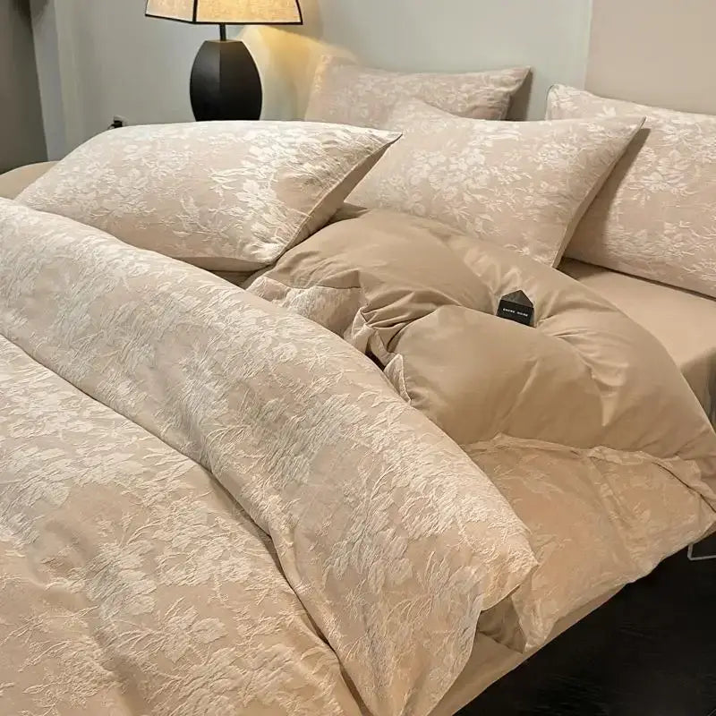 Beige floral-patterned satin duvet set with matching pillows in textured soft yellow decorbites cotton bedding set