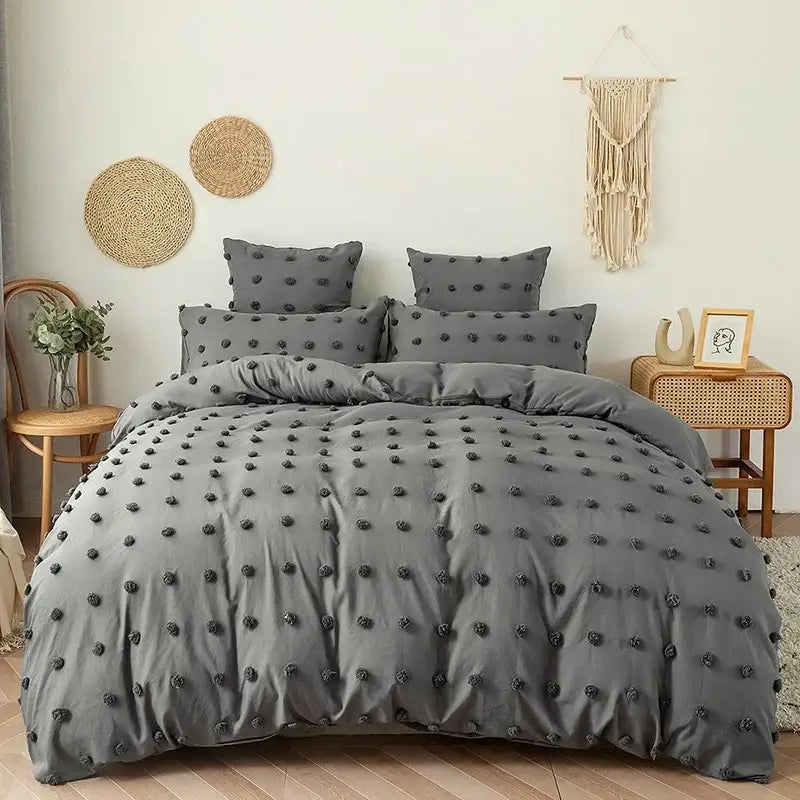 Gray duvet cover with black pom-pom embellishments in decorbites furball double bed textured white furball duvet set