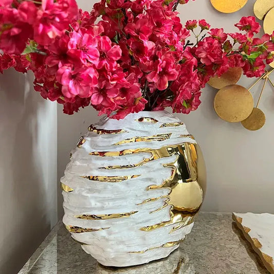 Textured white and golden ceramic vase with metallic accents by decorbites for elegant living room decor