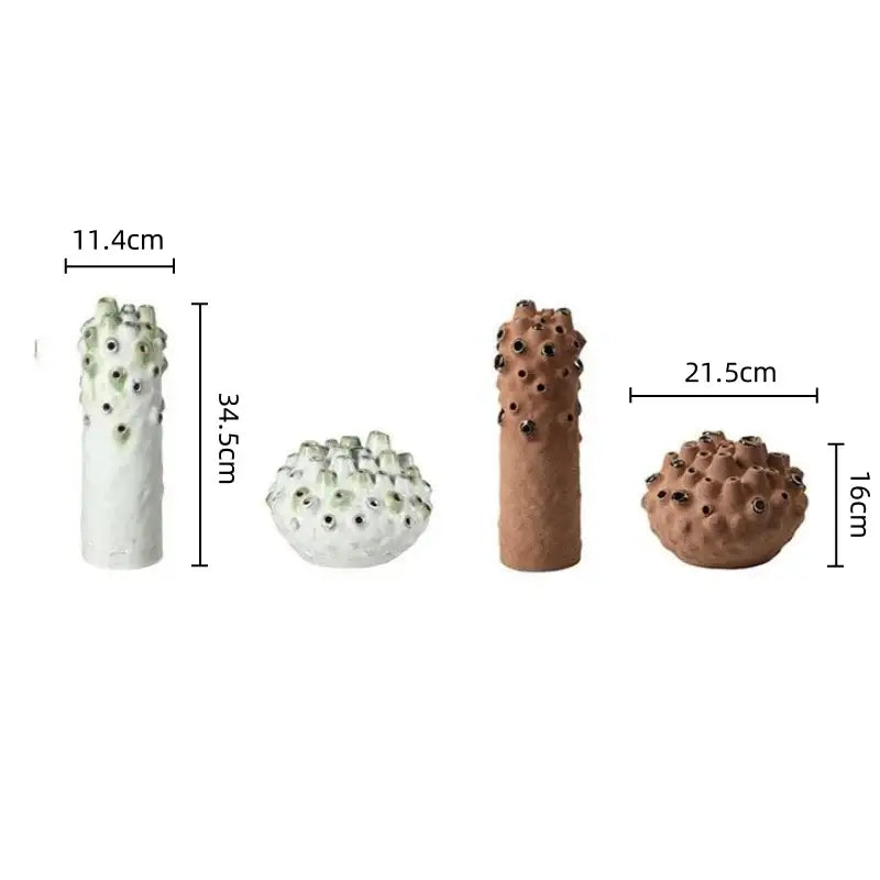 Set of four white and terracotta coral ball ceramic vases with textured surfaces and black accents for decorbites coral ball decor