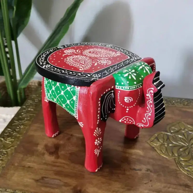 Thai style ethnic decorbites handmade elephant stool in vibrant red green wood with intricate white paisley patterns for living room decor