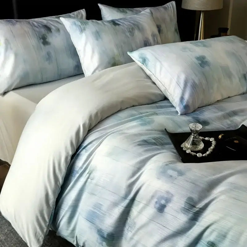 Blue and white abstract-patterned satin bedding set featuring decorbites cotton bedding for stylish bedroom decor