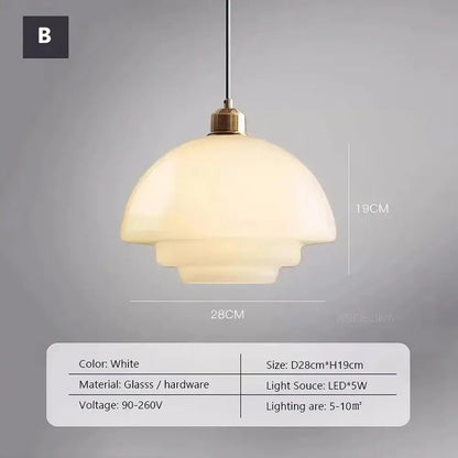 Tiered cream glass pendant light with dome-shaped design and brass hardware for dining room use