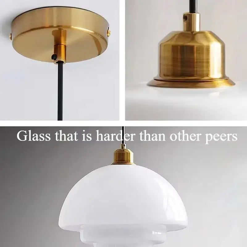 A tiered cream glass pendant light with brass and nickel finish featuring a sleek glass pendant for dining rooms